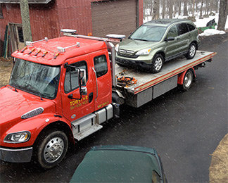 Auto haul on flatbed customers access towing in CT 24 hour per day