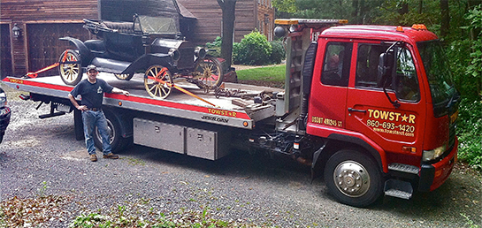 Specialty antique car flatbed hauling service in CT using Towstar