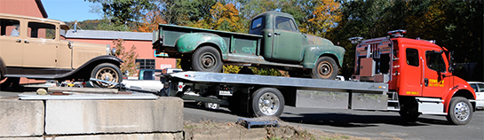 Specialty antique car flatbed hauling service in CT using Towstar