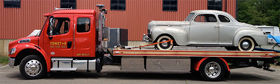 Specialty classic car flatbed hauling service in Connecticut using Towstar