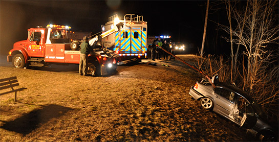 Recovering crashed car using tow truck in CT